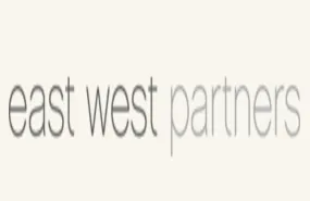 East West Partners logo
