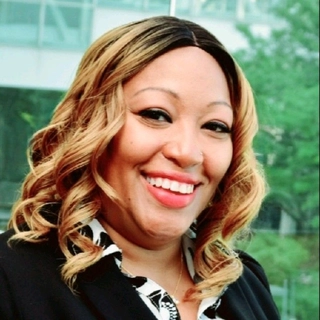 C. Monique Valeriano