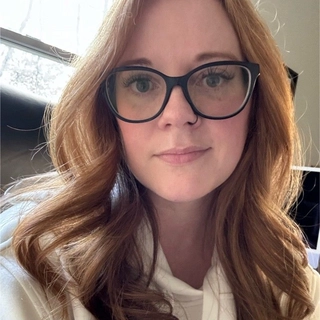 Caitlin Gilman Esclusa