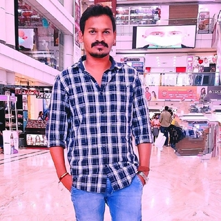 Charan R