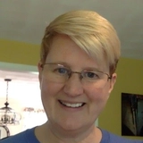 Chris Lynch (she/her)