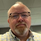 Christopher J Tallos