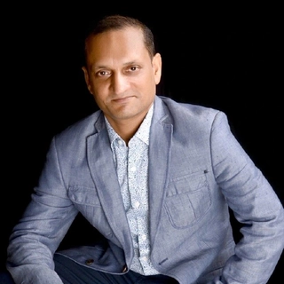 Dr Muneesh Garg