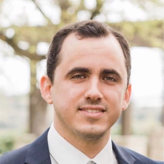 E. Alejandro Orfanos