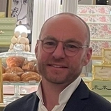John G.