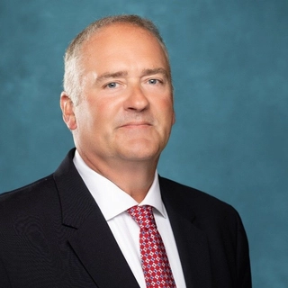 John T Melvin Jr.