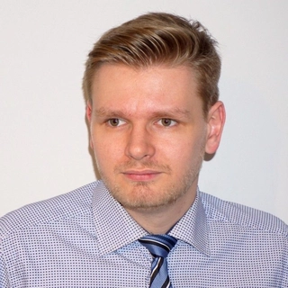 Michael Holland, BBA distinction