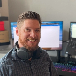 Michael Keller (He/Him)