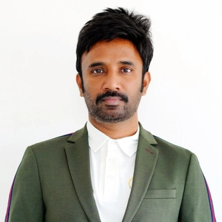 Naveen K