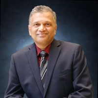 Nitin Divker. CPA, CGA