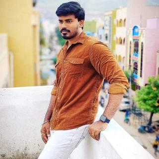 Purushotham C