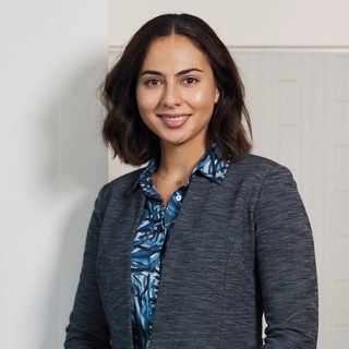 Rebecca-Camille Niumeitolu (She