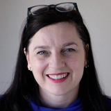 Suzette Vela Burkett