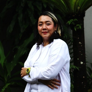 Titin Natalia E. Sitorus